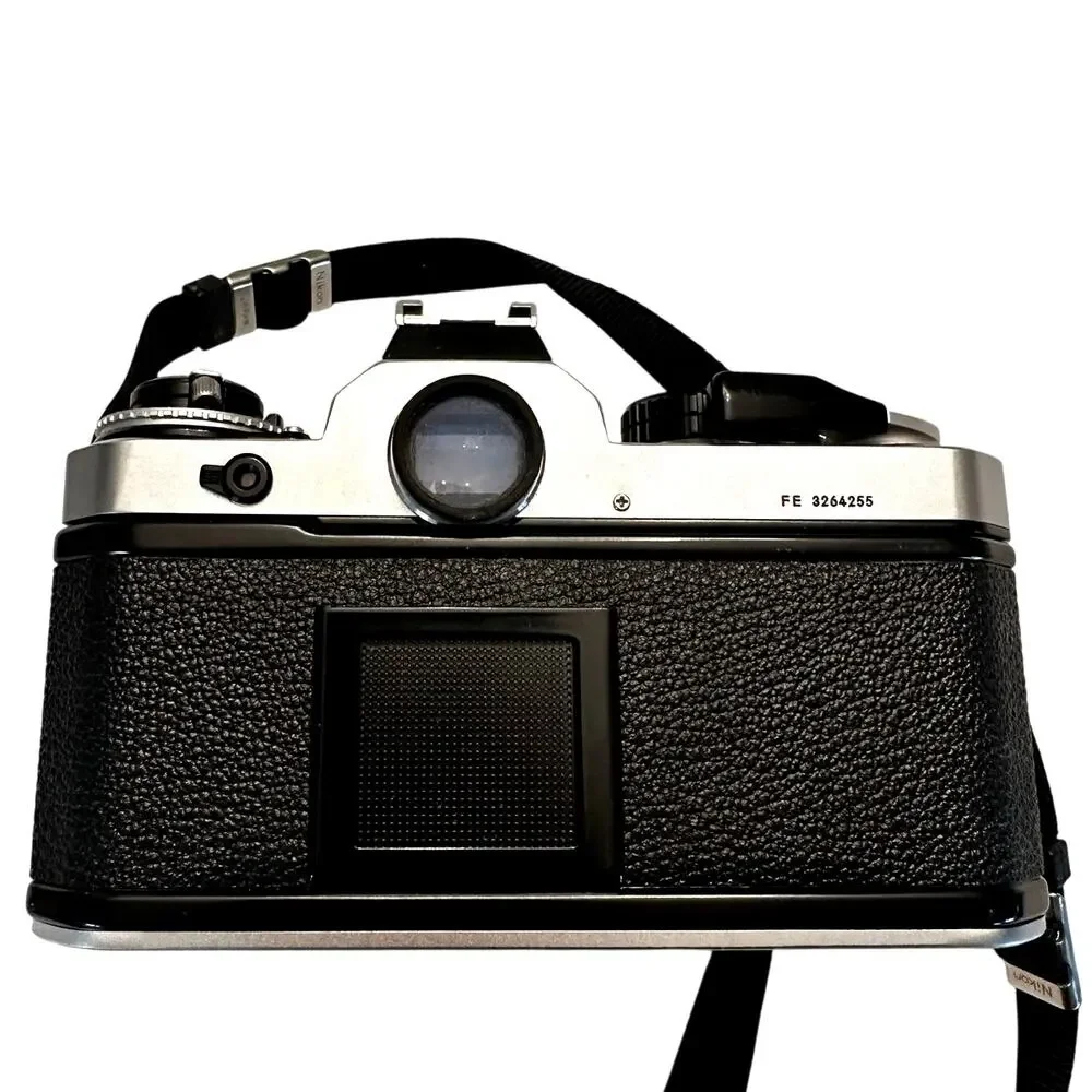 Nikon FM 35mm SLR Film Camera with Nikon Series E 150mm 1.8 Lens